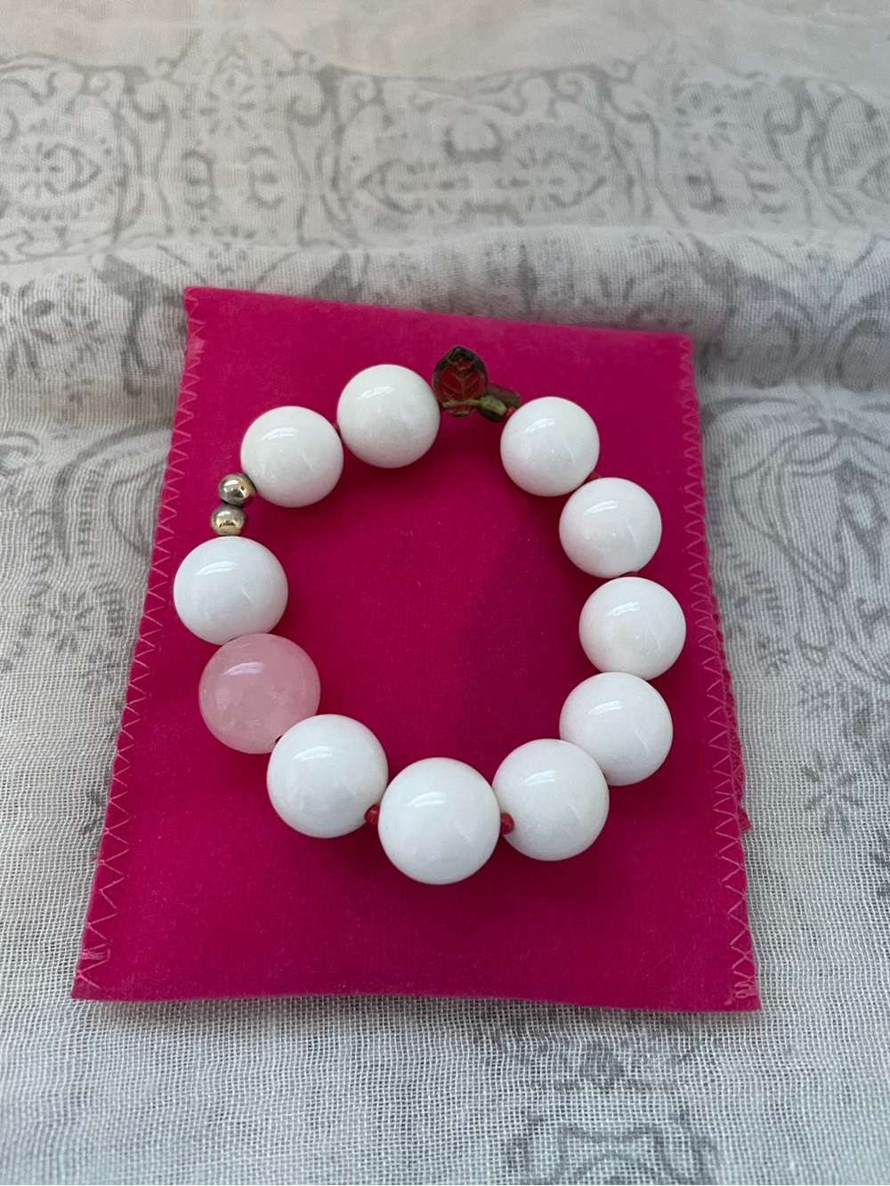 Jewelry- White Bead Bracelet with Pink Accent and green lead